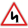 Panneau virages dont le premier est à gauche - A1d