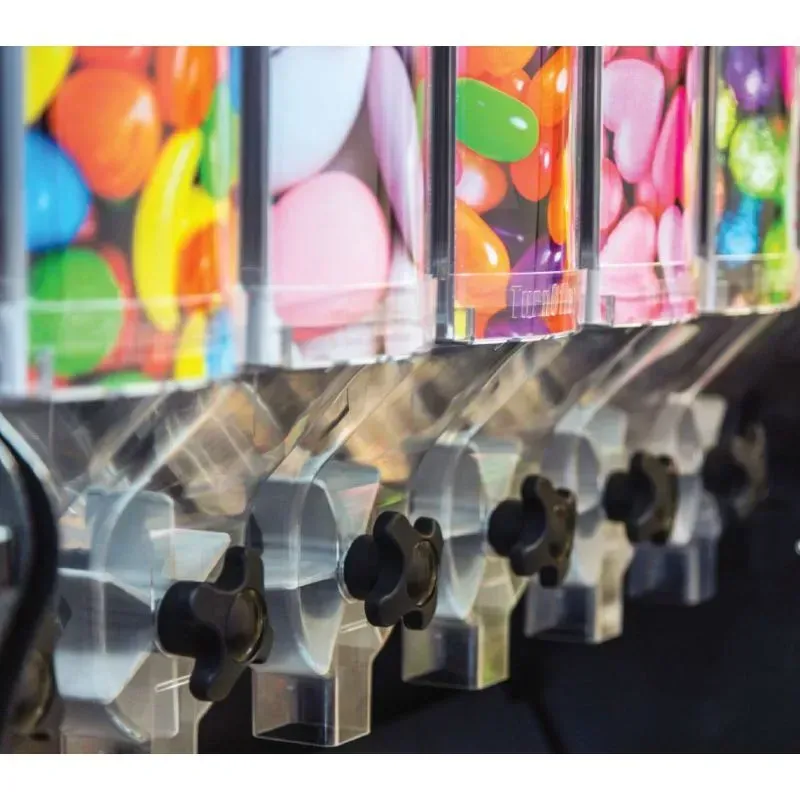 Distributeur vrac avec régulateur de quantité